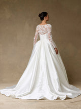 Off white bridal ball gown train back view with embroidered lace bolero