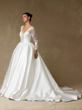 Off white satin ball gown wedding dress with lace sleeves side view