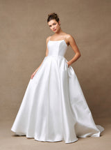 Off-white scoop-neck wedding ball gown front view with full skirt and side pockets