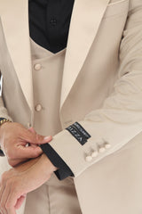 Tan three-piece peak lapel wedding tuxedo jacket detail
