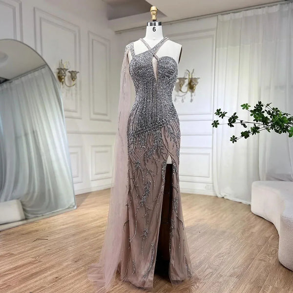 New Luxury High Fashion fully hand Beaded Mermaid gown with high slit and shoulder cape