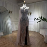 New Luxury High Fashion fully hand Beaded Mermaid gown with high slit and shoulder cape