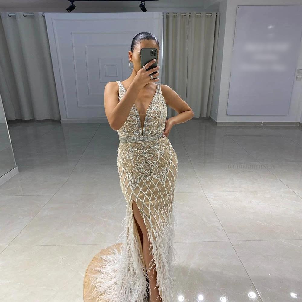 Luxury White Feathers Split Dress- Long Nude Beaded Mermaid – Sandra's Bridal Collection Luxury White Feathers Split Dress- Long Nude Beaded Mermaid – Sandra's Bridal Collection