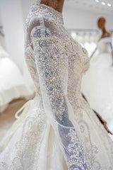 Luxury Princess long sleeve Glitter and Lace fully Beaded Ball Gown