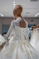 Luxury Princess long sleeve Glitter and Lace fully Beaded Ball Gown