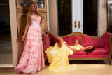 Pink floor-length layered ruffle formal gown editorial view