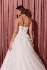 Back view of off-white wedding gown with lace-up corset back
