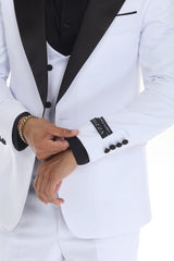 White three-piece black peak lapel wedding tuxedo jacket detail