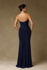 Back view of navy blue strapless evening gown with lace-up corset closure