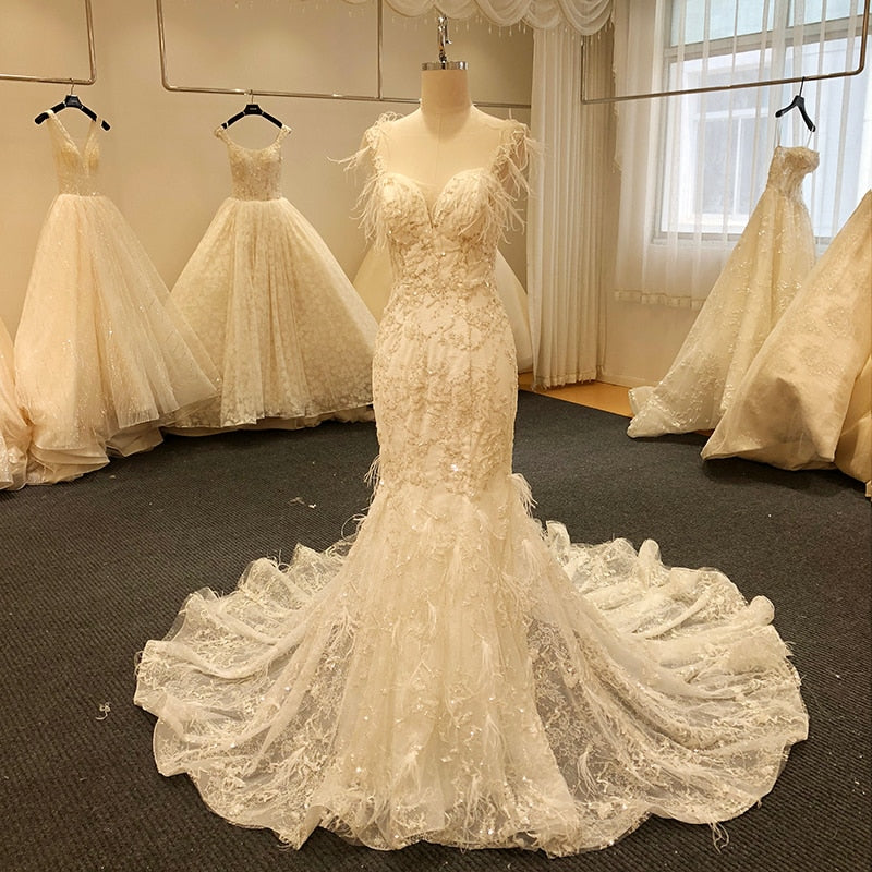 mermaid wedding dress with feathers Luxury Wedding Dresses, Feather Wedding Dresses, Off White Wedding Dresses, Robe de Mariage, Mermaid Wedding Dresses, Lace Applique Wedding