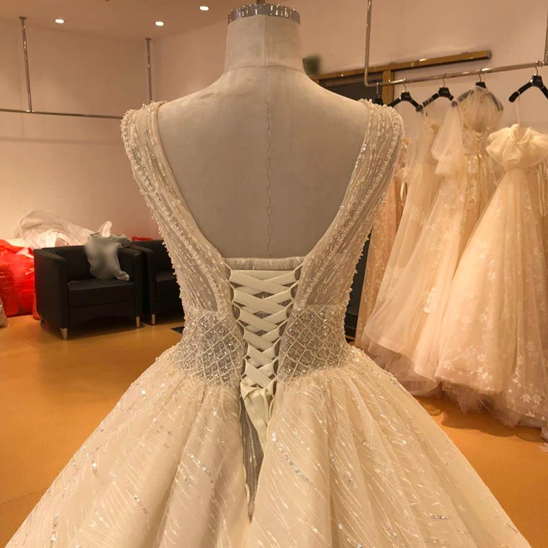 NEW ARRIVAL 2021 Deep V-Neck Elegant Gown Sandra's Bridal Collection NEW ARRIVAL 2021 Deep V-Neck Elegant Gown Sandra's Bridal Collection