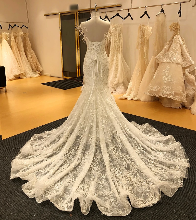 New Arrival Crystal Embroidery Lace and Feather Mermaid Dress Sandra's Bridal Collection New Arrival Crystal Embroidery Lace and Feather Mermaid Dress Sandra's Bridal Collection