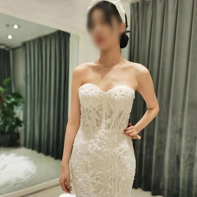 tiered mermaid wedding dress Luxury Mermaid Wedding Dress 2026 Strapless Sleeveless Lace-Up Cascading Ruffles Tiered Court Train Bridal Gown from Dhgate Mermaid Wedding Dresses
